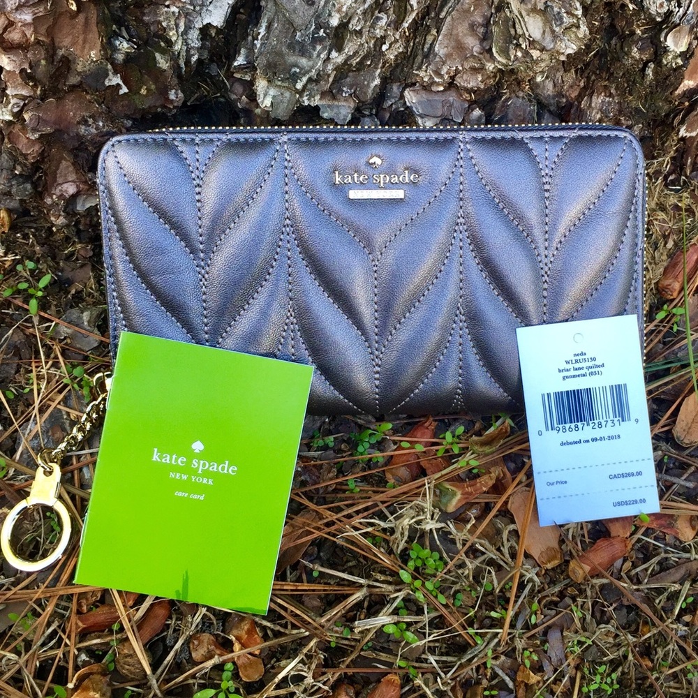 ♠️ KATE SPADE ♠️ quilted style zip-around clutch!